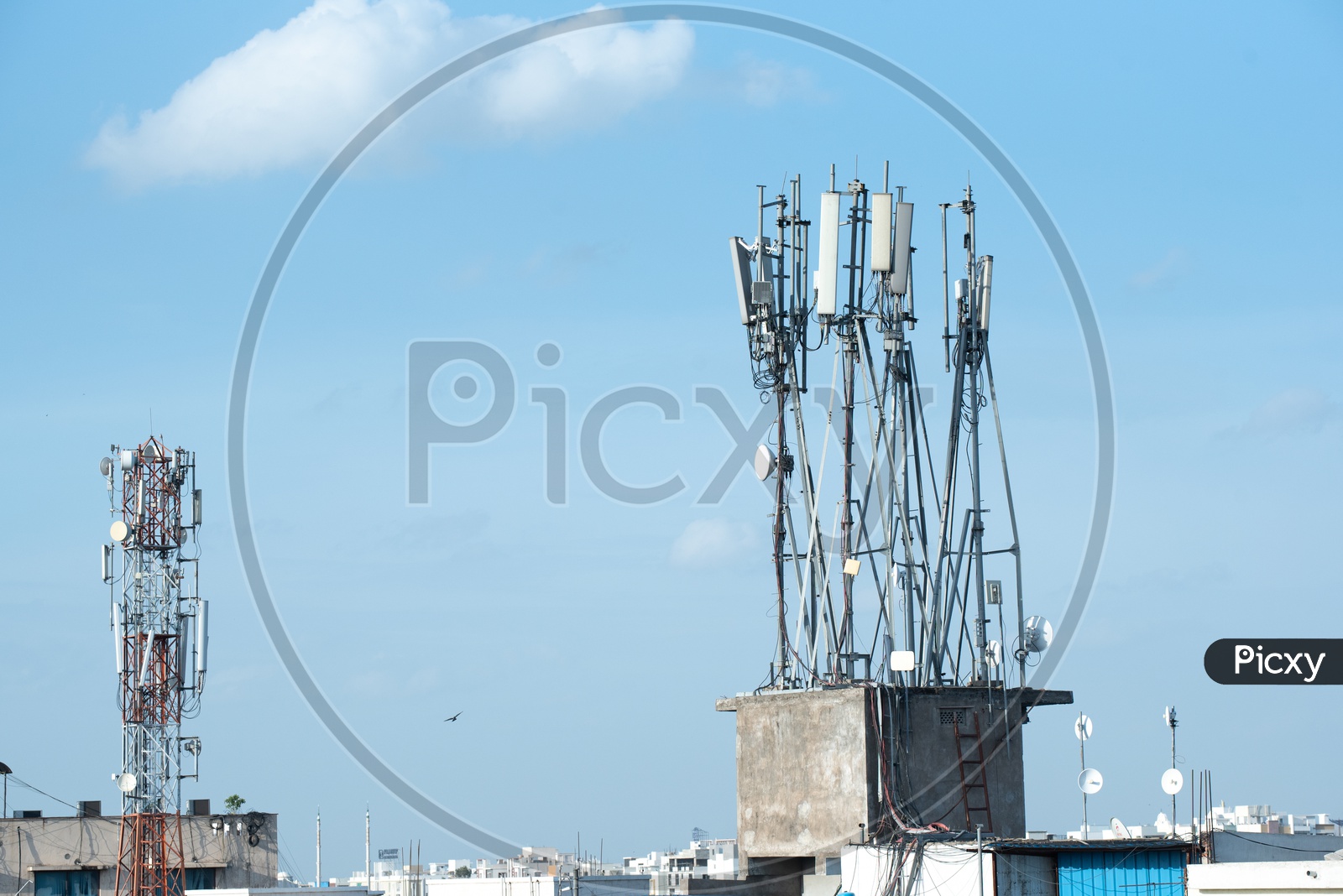 Cellular network Towers On Building Tops