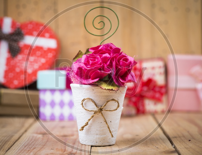 Christmas Or X-mas Template Background With Flowers  And Gifts On Wooden Background