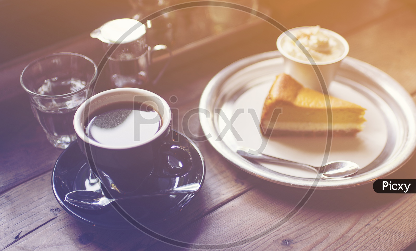Coffee in Black Cup and cake, vintage filter image