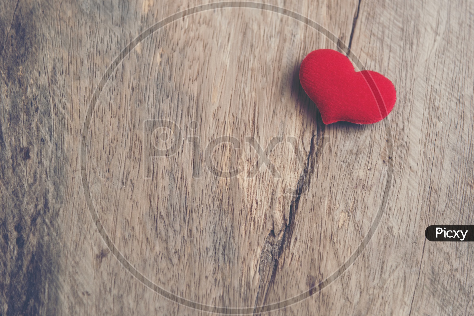 Valentines Day Love Concept With Red heart Shape On an Wooden Table  With Vintage Filter