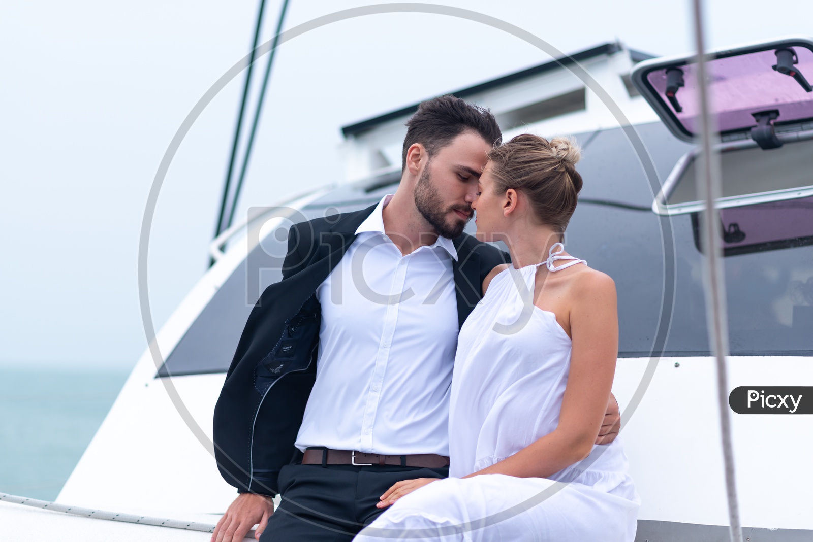 Young Couple Celebrating  Wedding Anniversary on a yacht