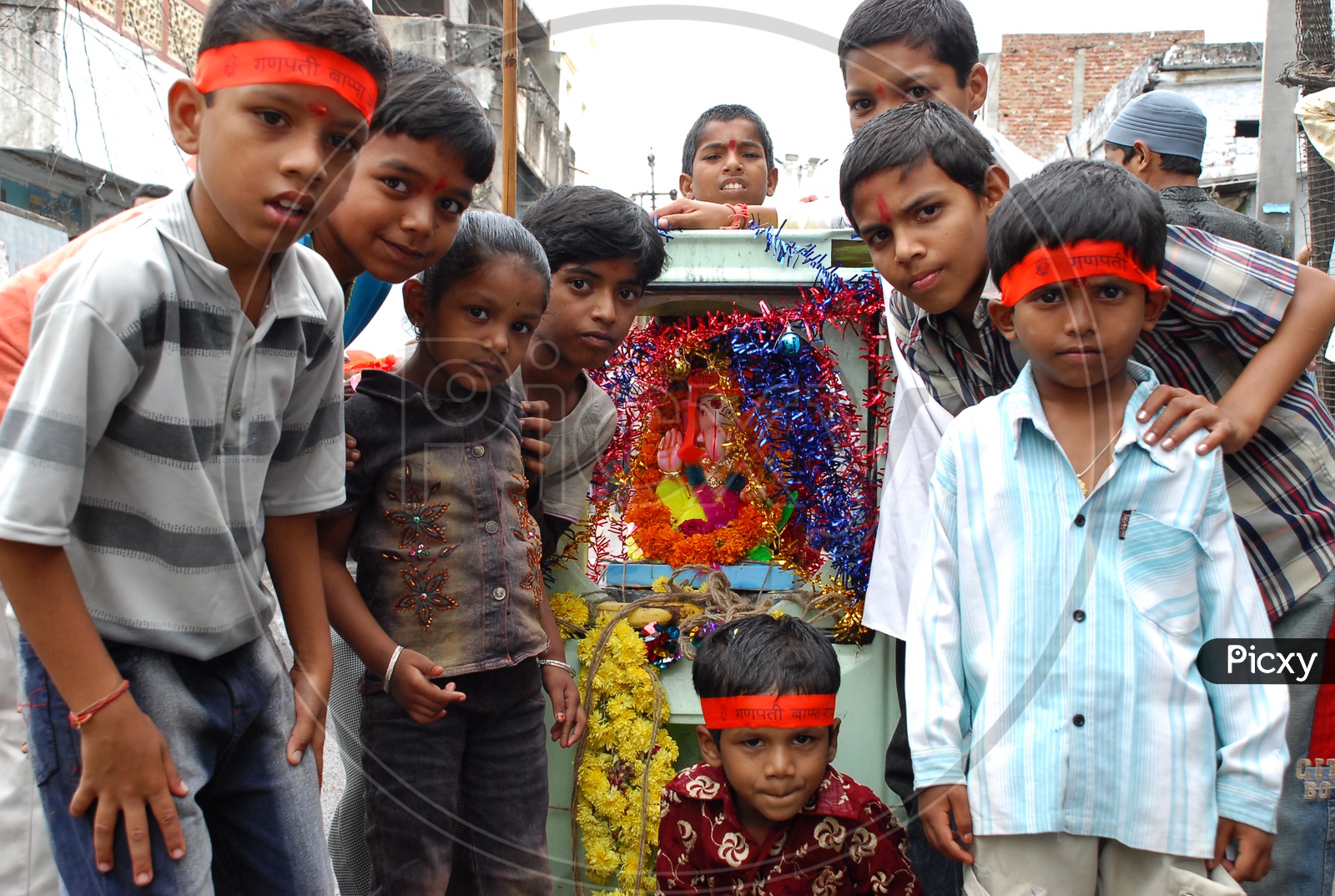 Indian Children With Lord Ganesh Idol During Festival