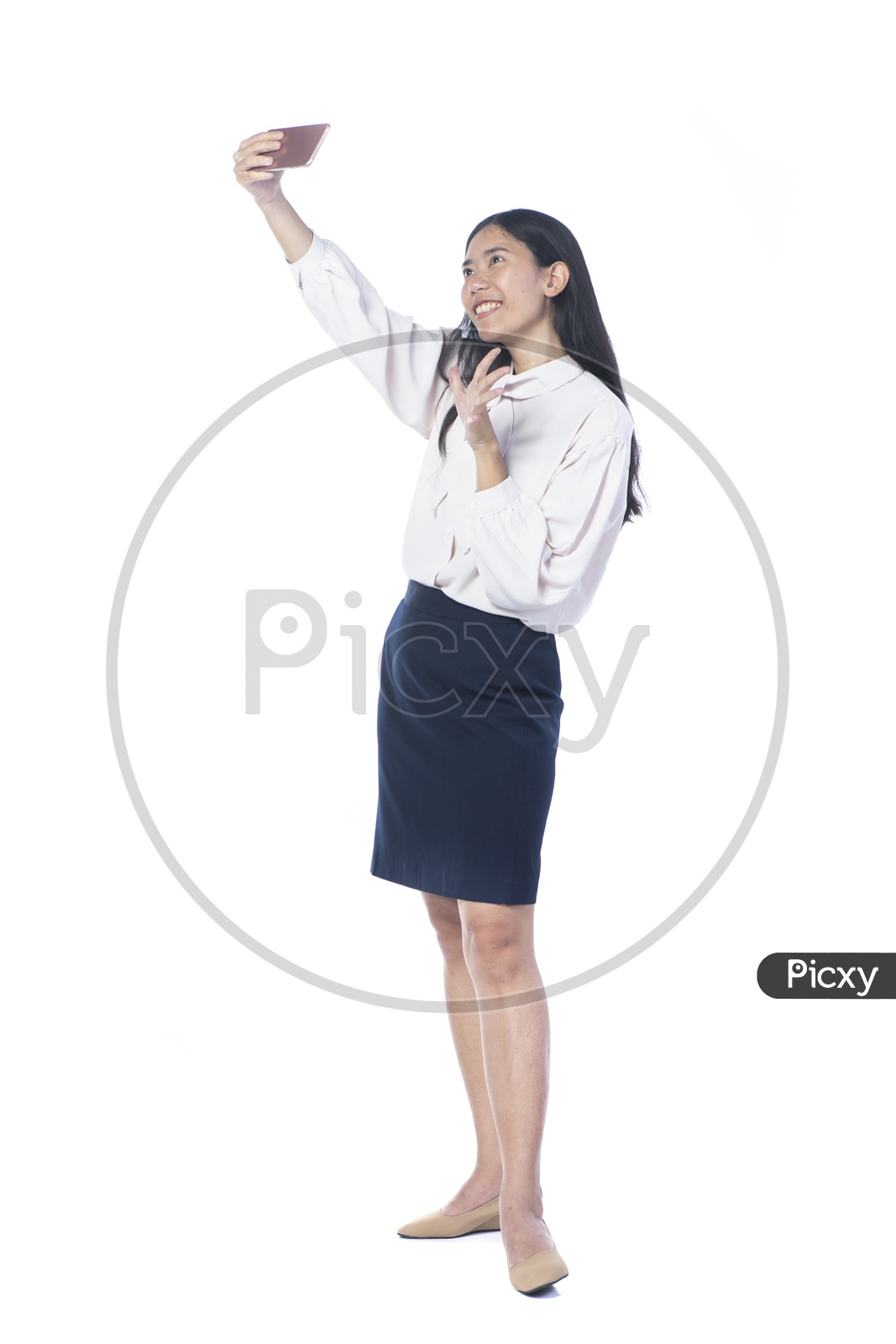 Young Thai Woman Taking a Selfie on Mobile or Smartphone Isolated on White Background