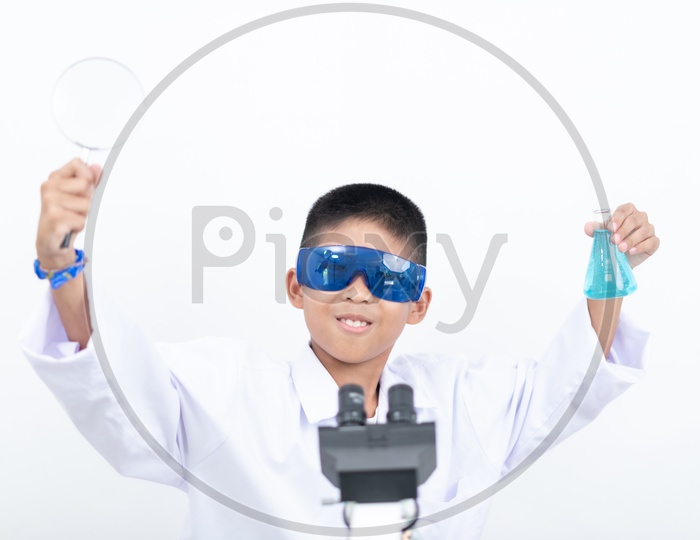 Asian Child Scientist Learning in Laboratory