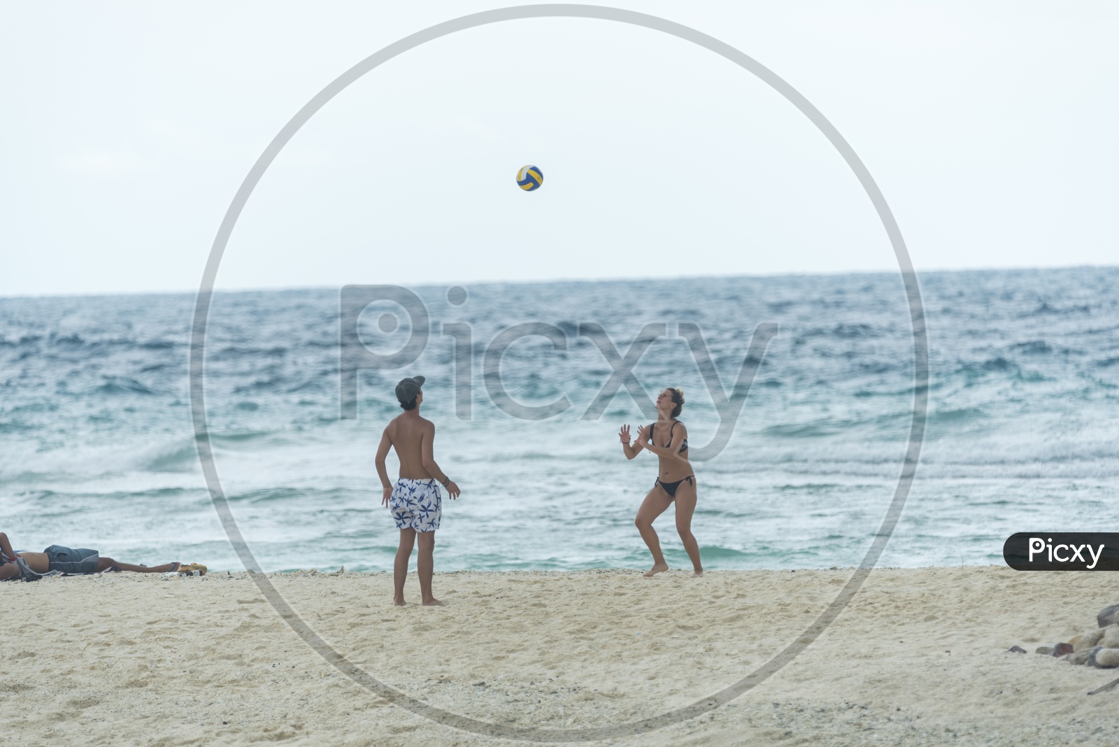 Tourists Playing Beach volleyball  in Phuket beach