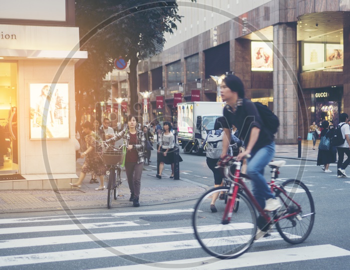 Japanese People using Bicycles on Streets, Japan