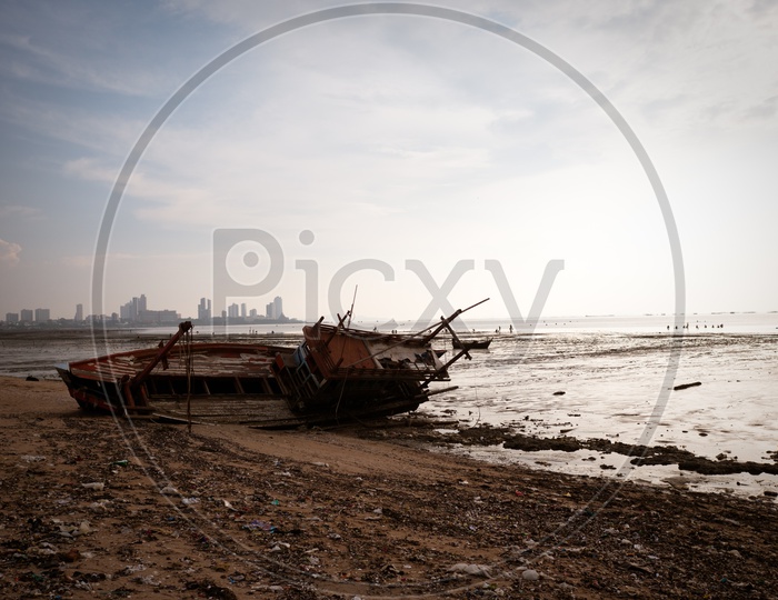 View of boat wreck alongside the Thailand beach