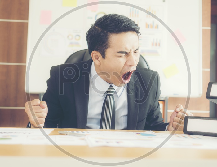 Stressed or Frustrated Business man or Employee At Office Work Scape