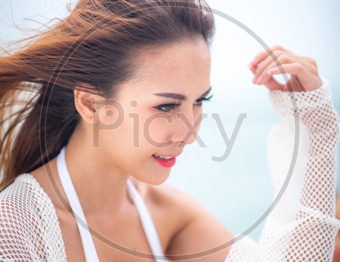 Young Asian Pretty Woman in Bikini on Yacht