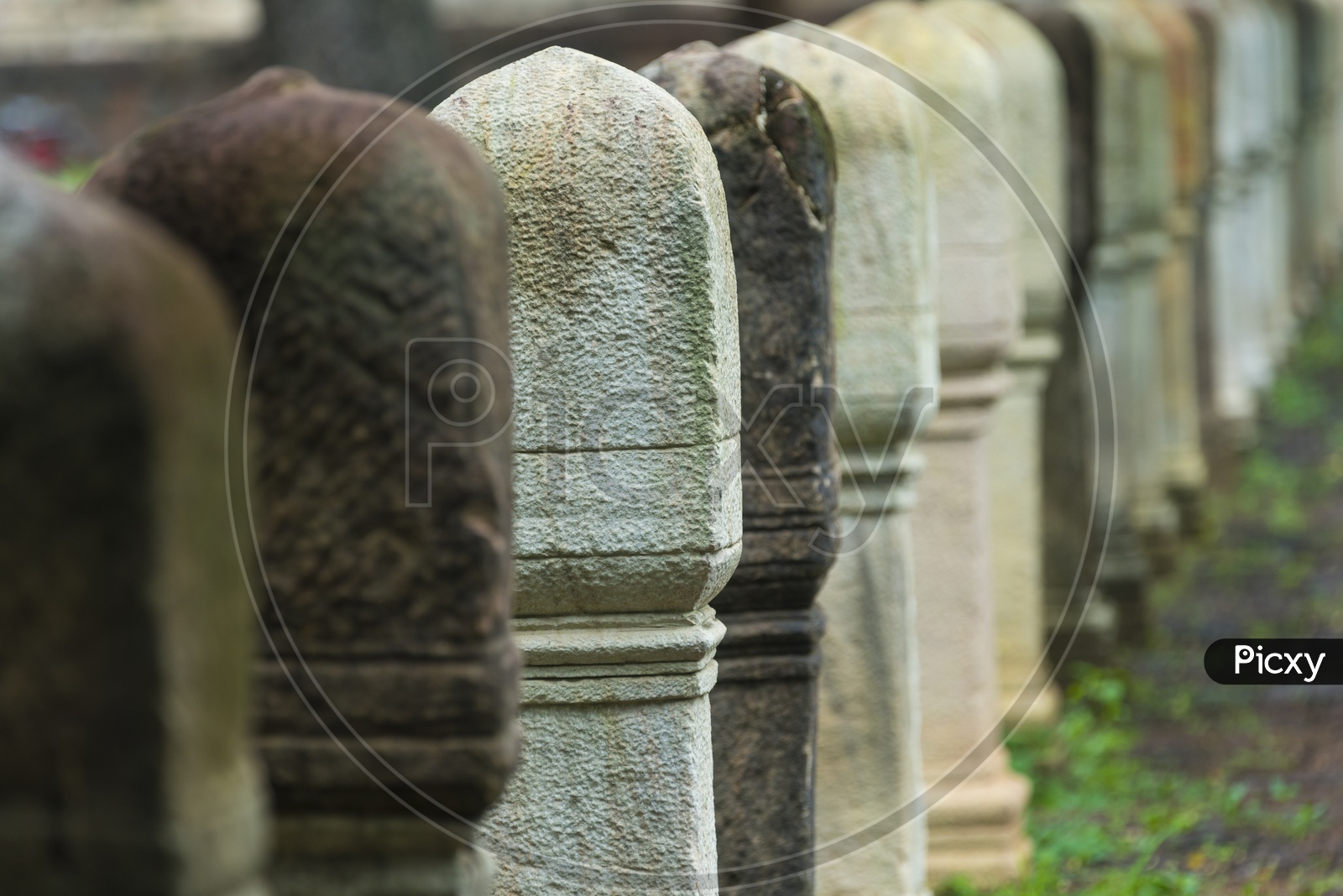 Railing Pillars Carved With Stones At Ancient Buddha temple in Thailand