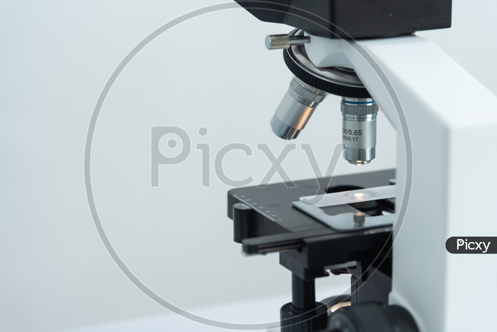 Close-up Shot of Microscope Lens at Laboratory