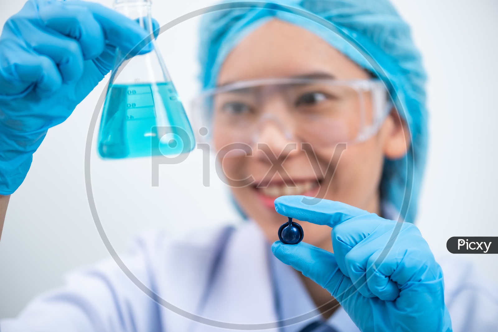 Young Asian Woman Scientist Holding Fish Oil Pill Or Capsule In Hand, Healthy Nutrition