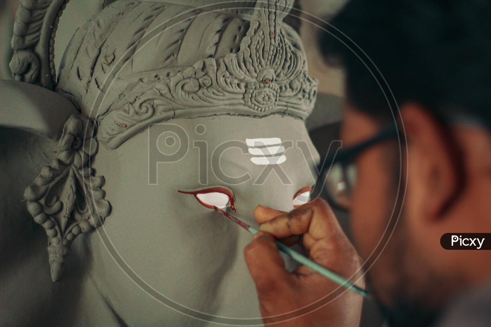 Painting the eyes of lord ganesh