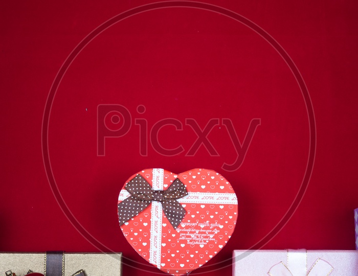 Top view of Gift boxes with red background - abstract picture for Valentine day, vintage filter image