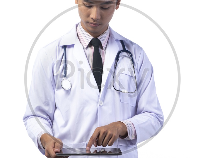 Asian Doctor with Stethoscope using Tablet or iPad isolated on White Background
