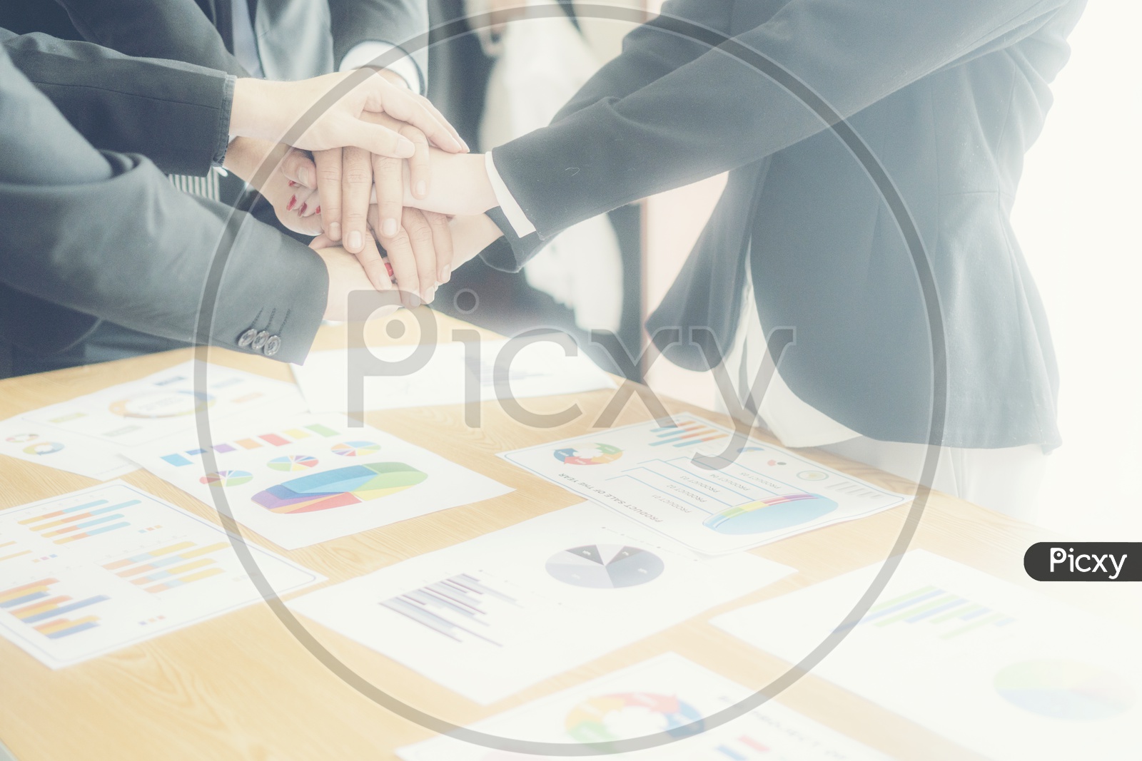 Close up of business people hands together - Corporate Meeting Teamwork Concept - With hot light