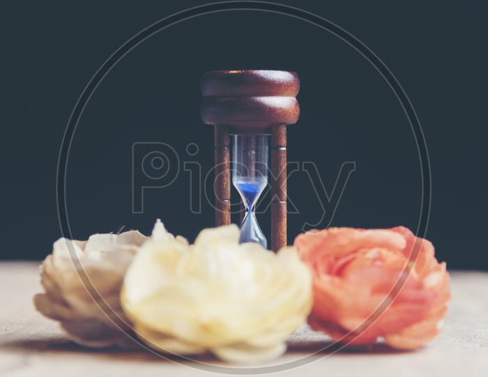 Rose flowers with hour glass, Valentine day concept