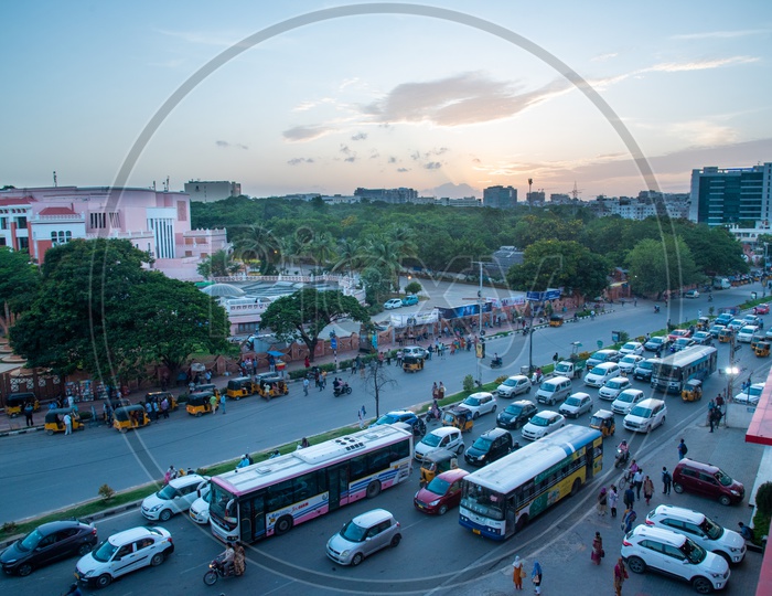 Commuting Vehicles At Hitech City traffic Signal With Shilpakala vedika In Background