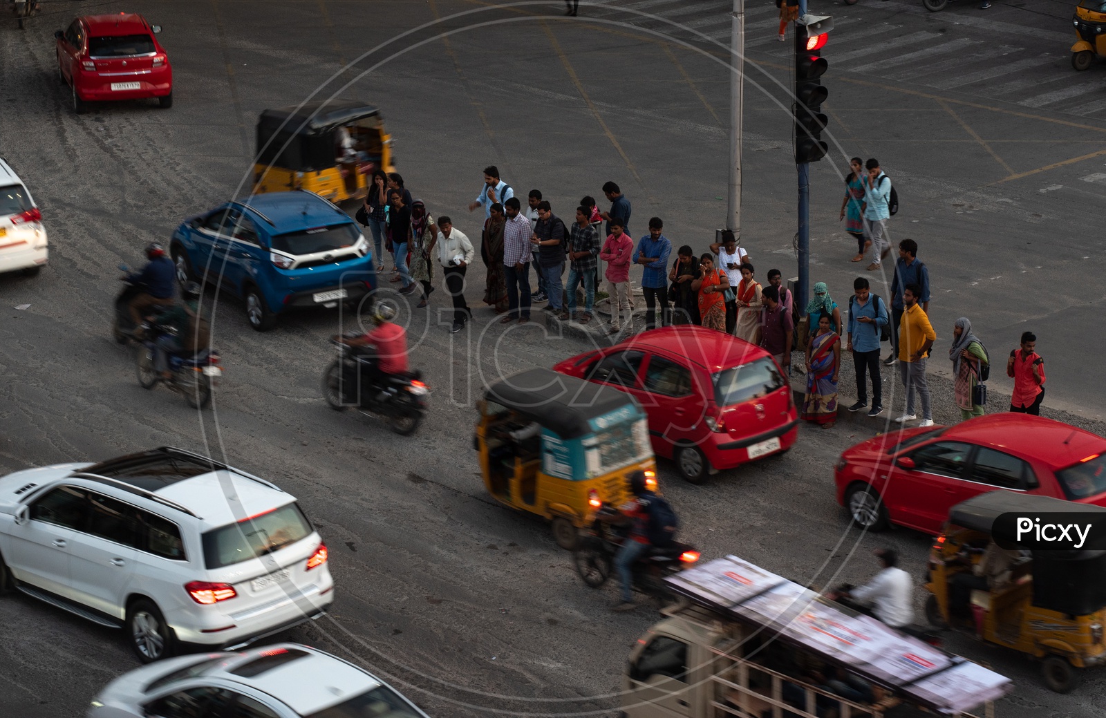 Pedestrians Waiting at a traffic Signal