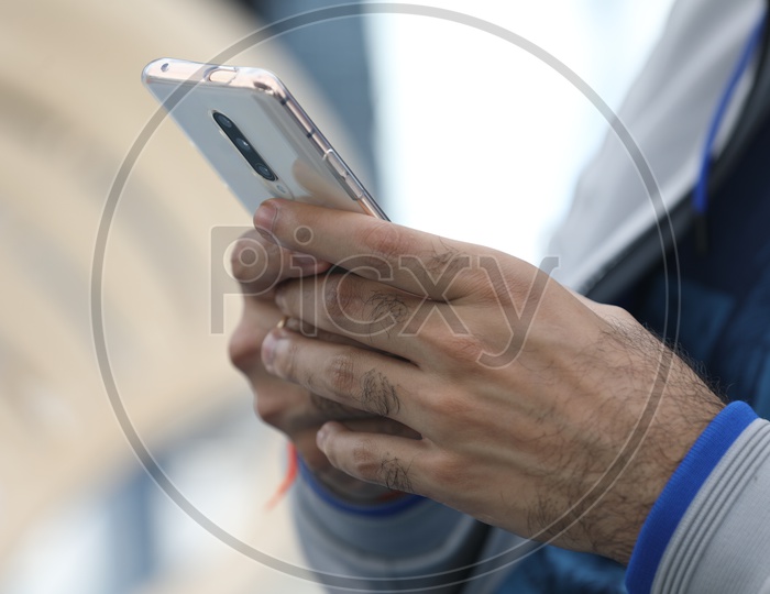 A Smartphone in the hands of a man