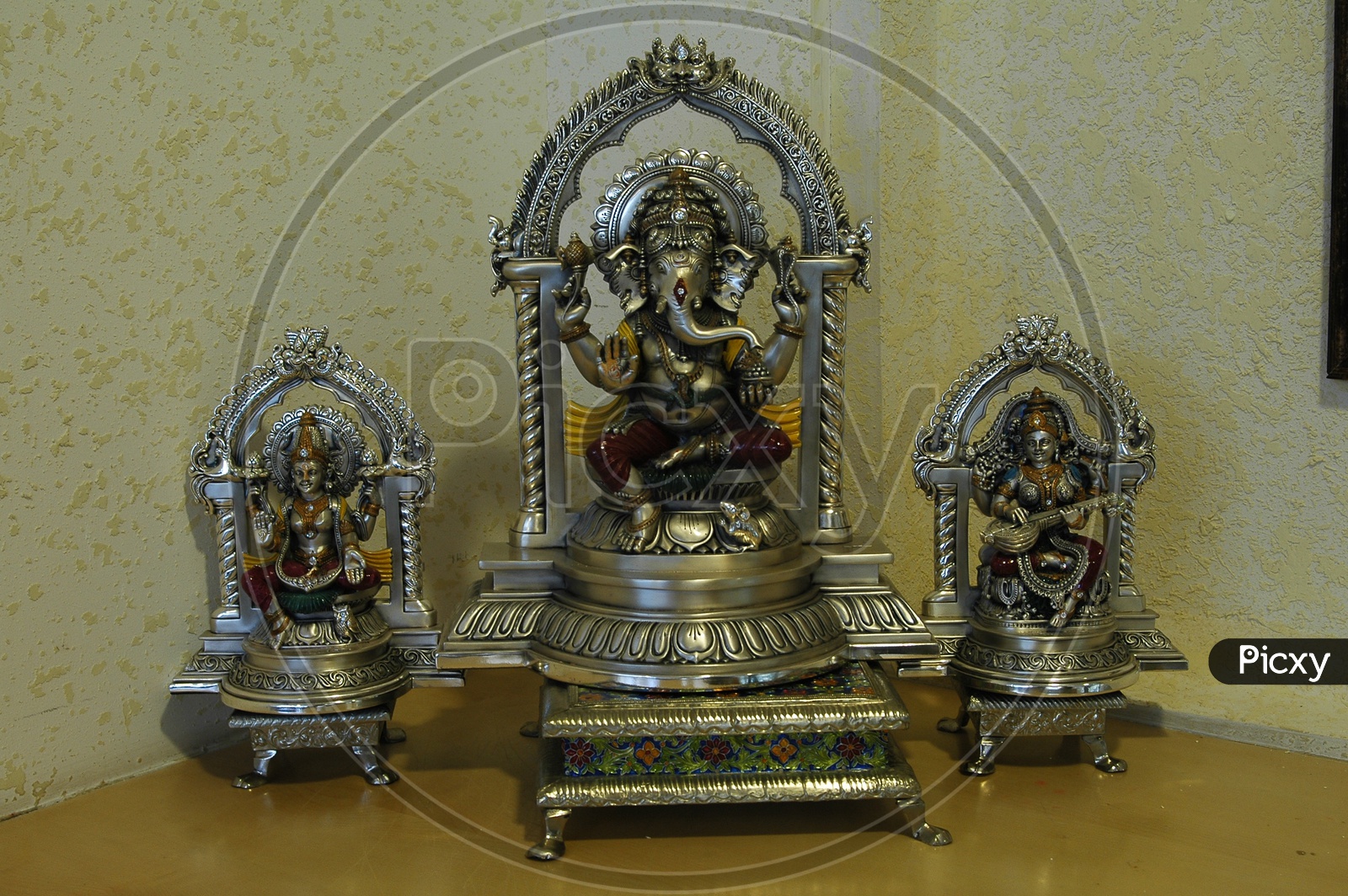 Lord Ganesh Silver Idol In a Prayer Room