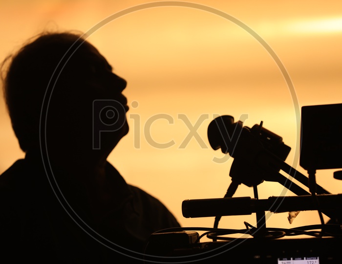 Silhouette of a Cinematographer working