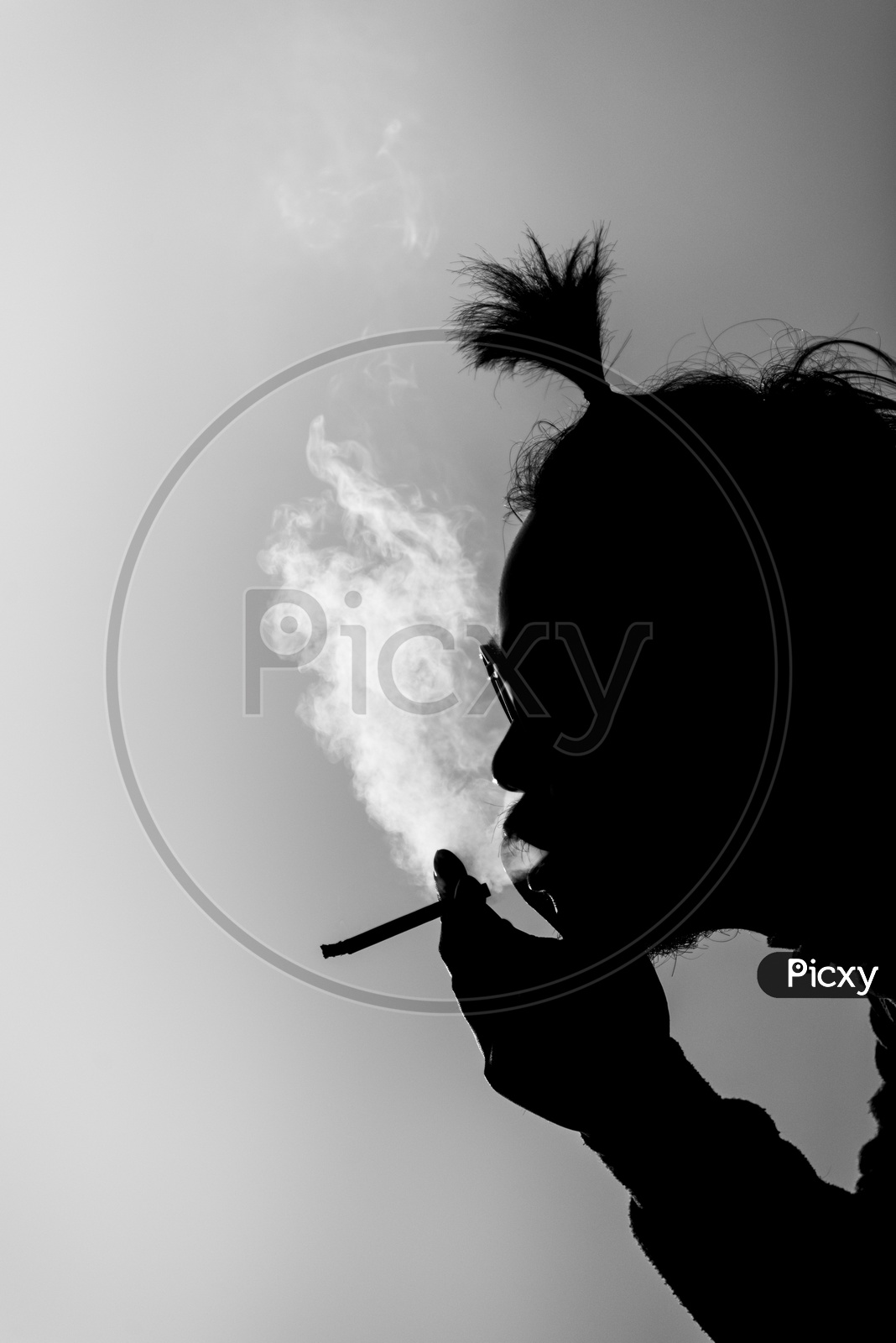 silhouette of a smoking man