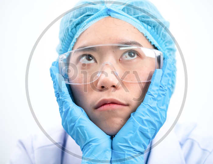 Young Asian Female Scientist Thinking