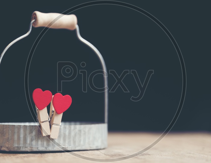 red hearts Love And valentines Day Concept  on an isolated Black Background  With Space