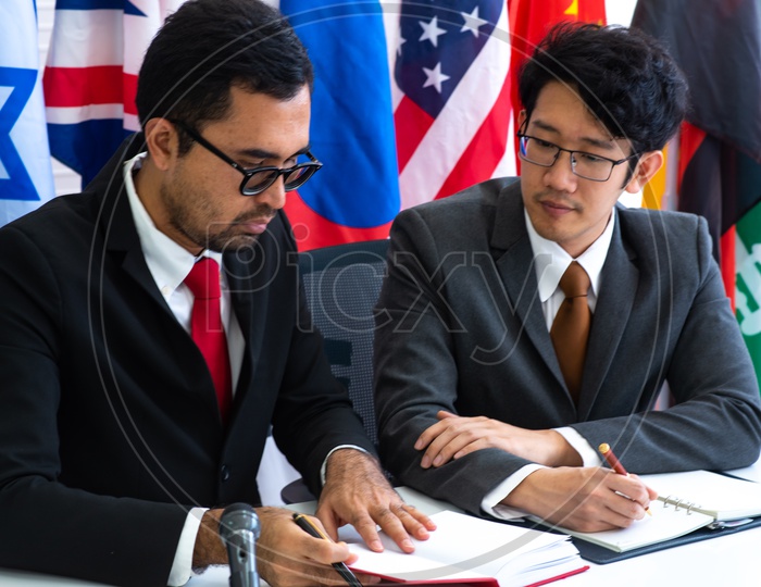 Asian Businessman Completing a deal in Meeting, Partnership, Collaboration, Corporate concept