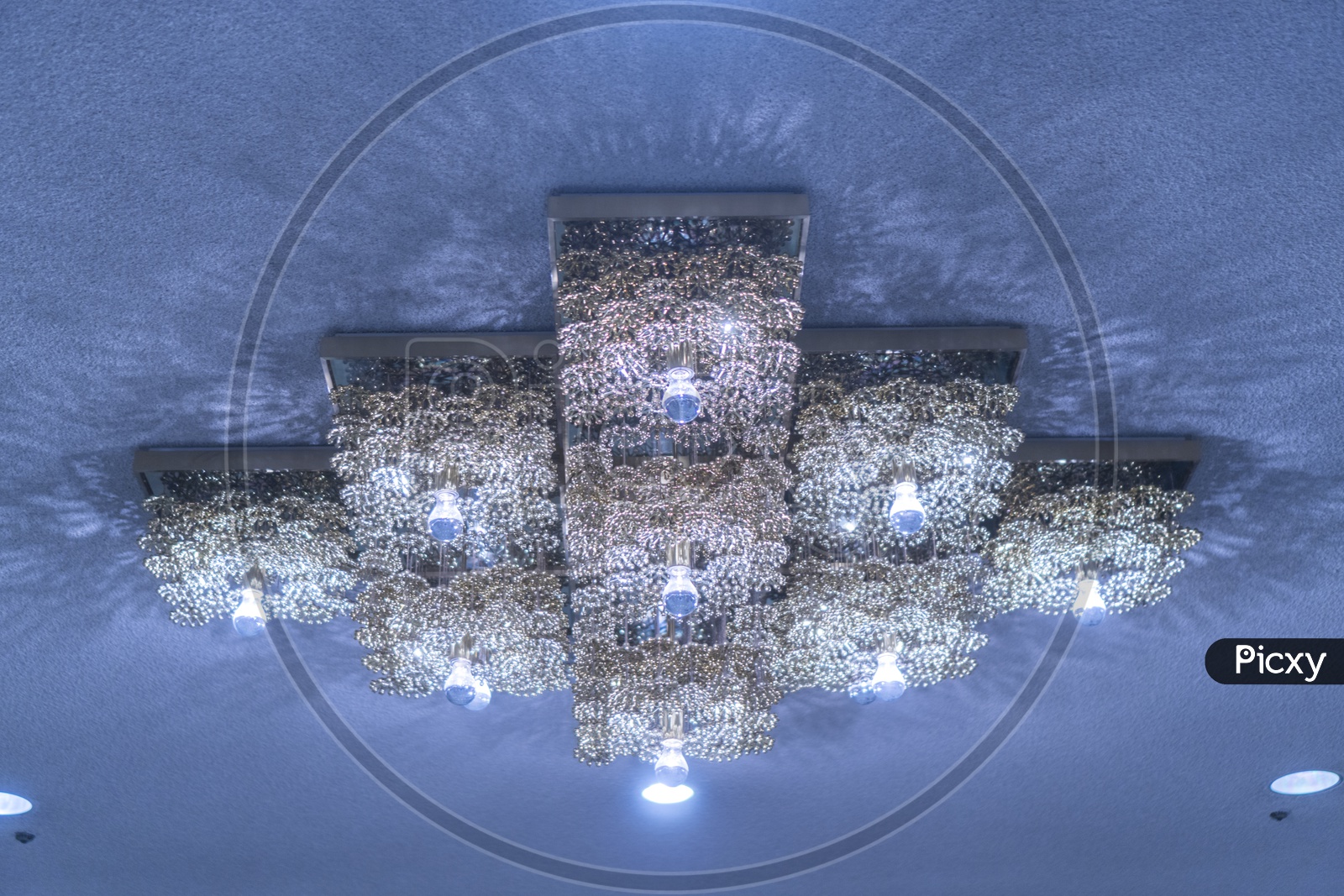 Abstract Bokeh Background of Chandelier in Luxury Hotel, Thailand