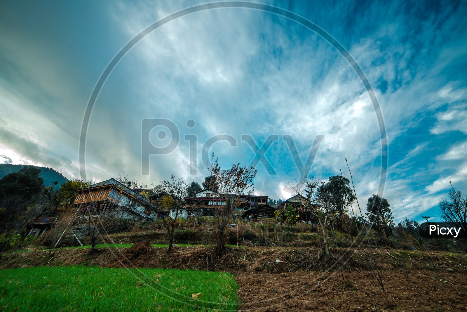 Agricultural Fields in The Villages Of Himalayan Mountains  With  Blue Sky in Background