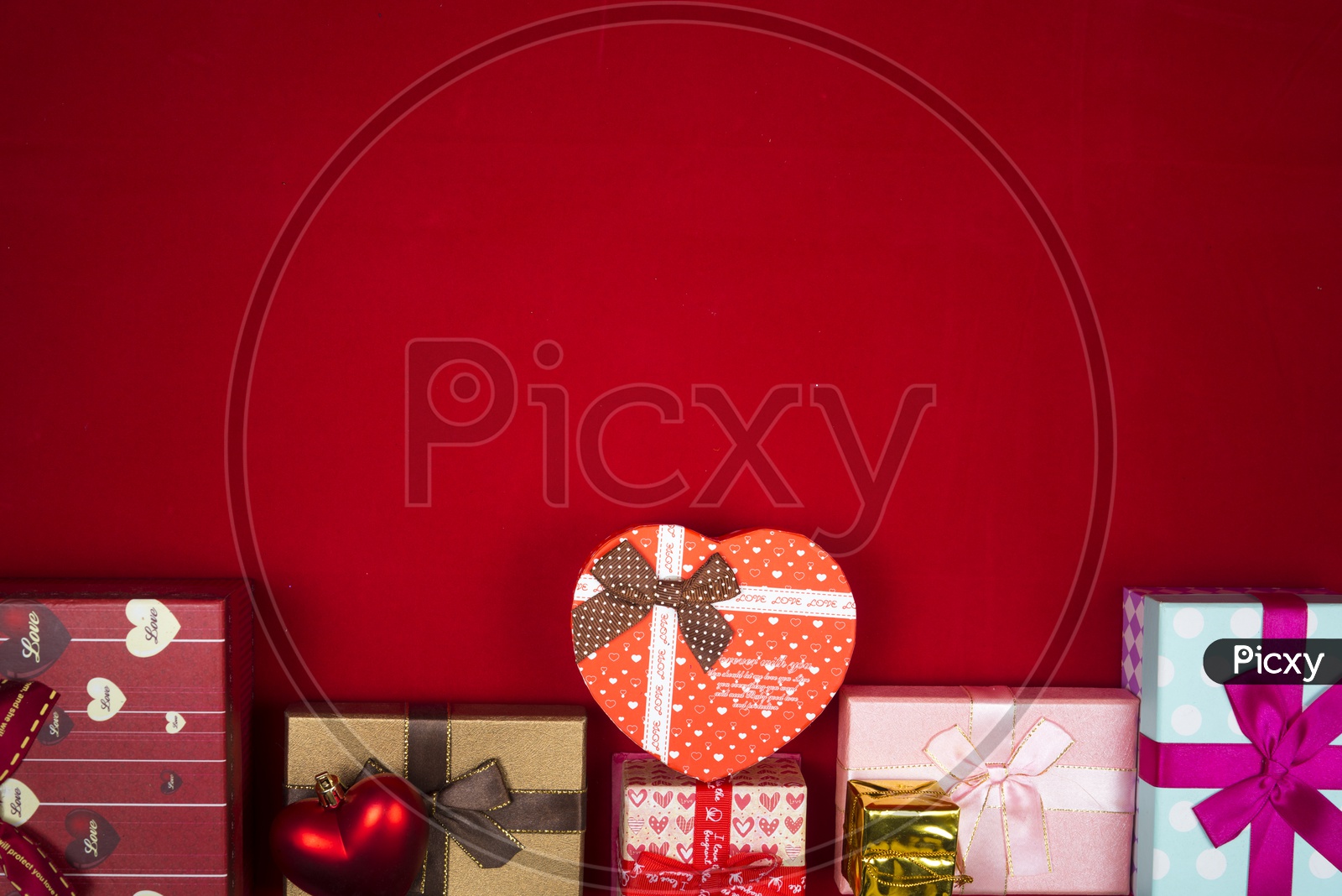 Gift boxes with red background - abstract picture for Valentine day, vintage filter image