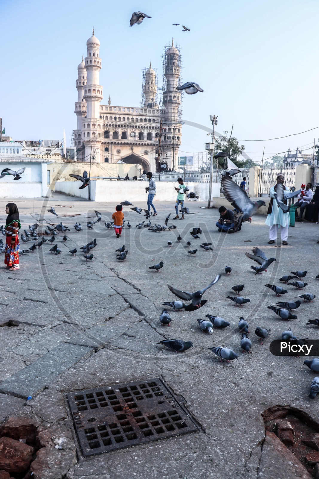 Potholes or Drain Shields in Mecca Masjid With Charminar View