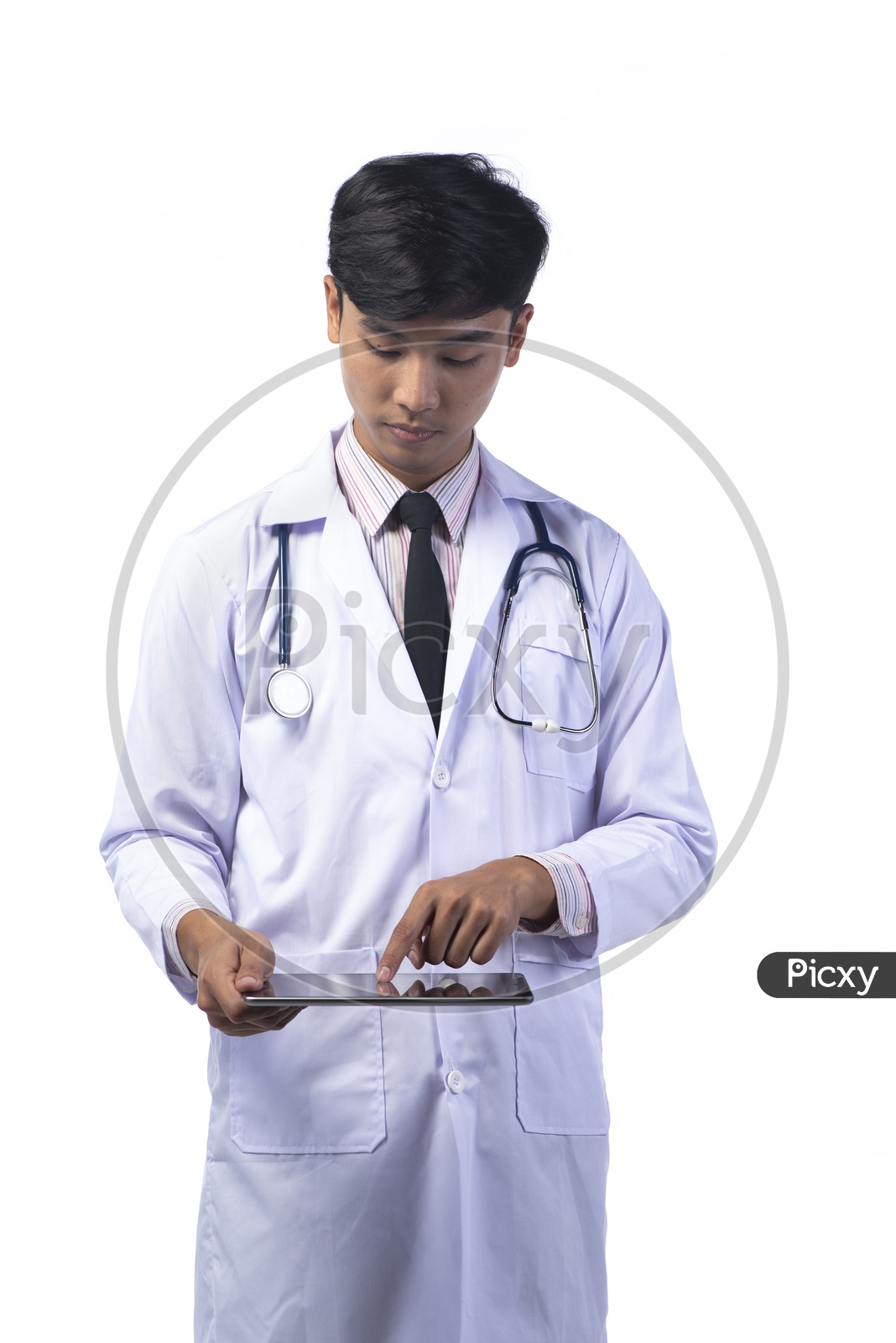 Asian Doctor with Stethoscope using Tablet or iPad isolated on White Background