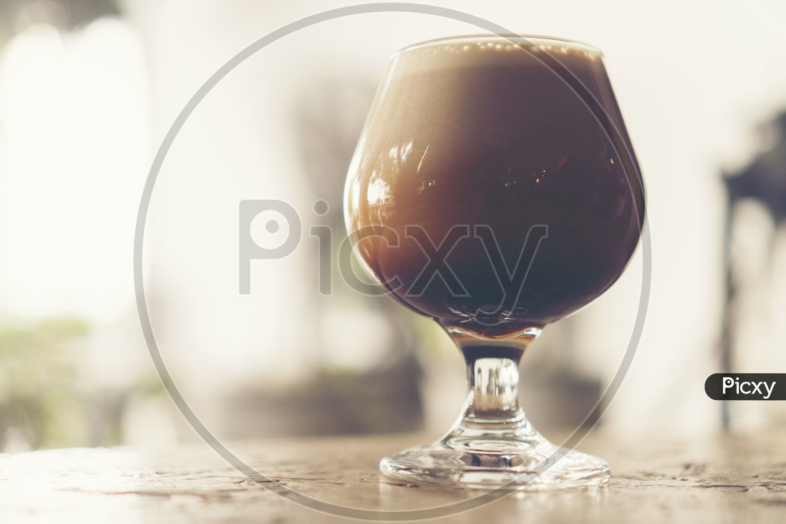 Frothy Sparkling Nitro Cold Brew in Coffee Shop