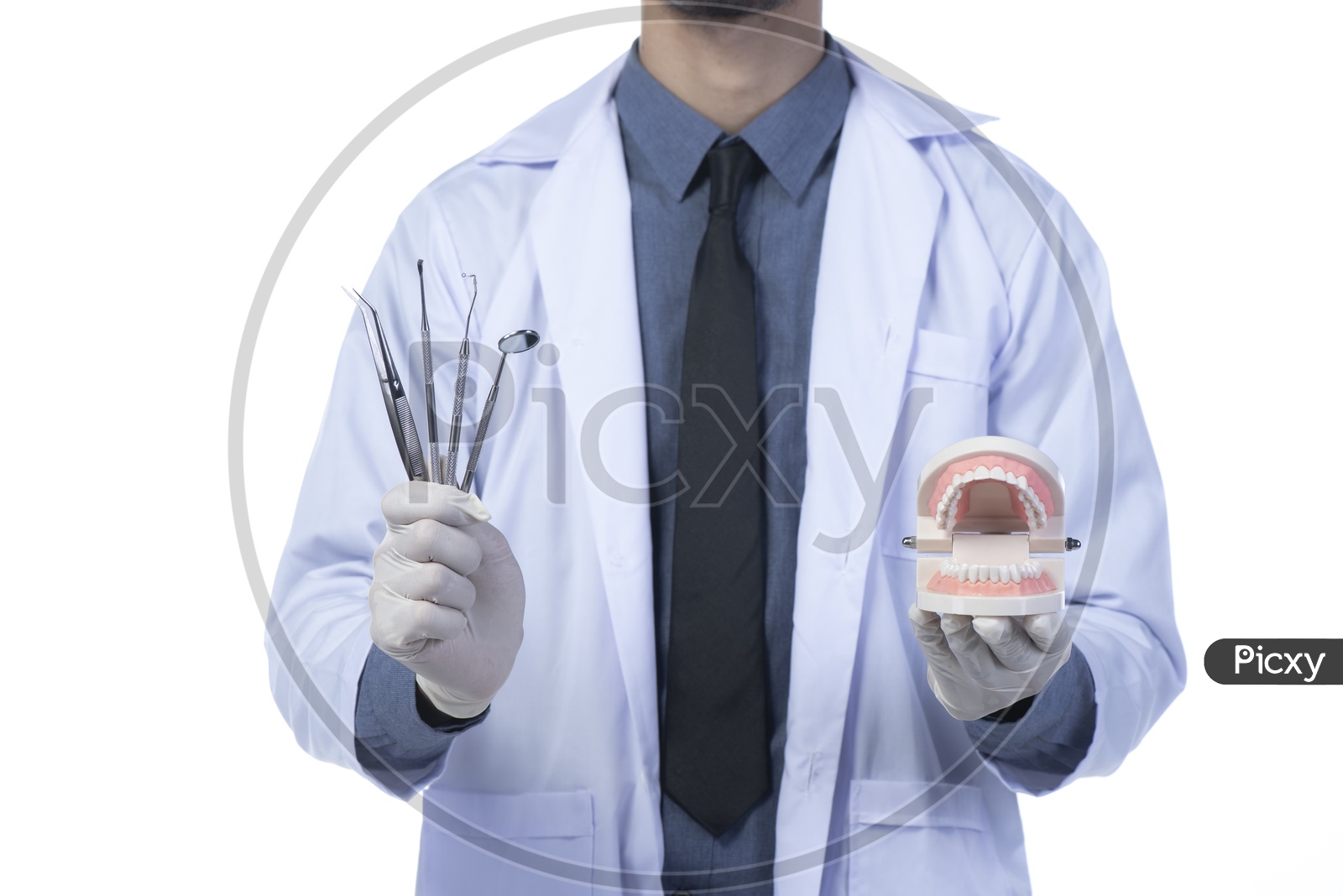 Asian Male Dentist Doctor with Dental tools isolated on white background