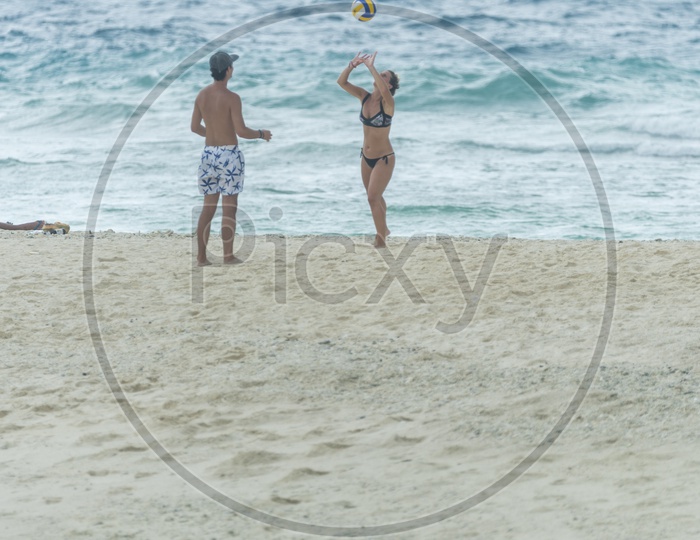 Tourists Playing Beach volleyball  in Phuket Beach