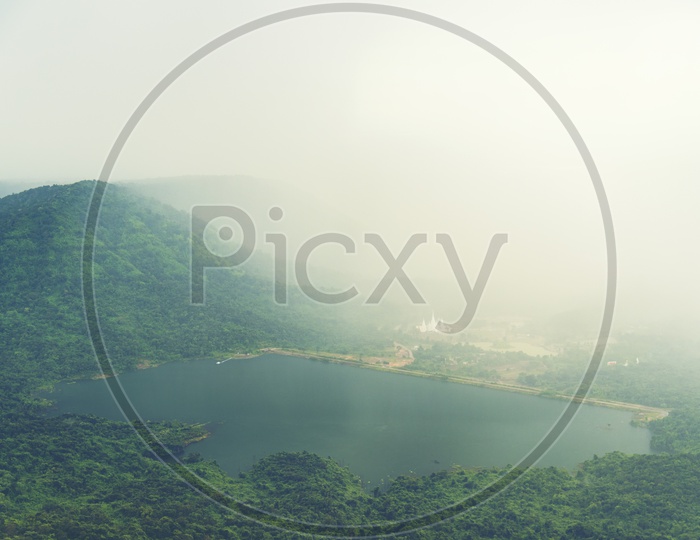 Landscape View Of Tropical Forest From a Hill top With Fog Clouds In khao Yai National Park