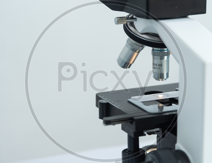 Close-up Shot of Microscope Lens at Laboratory
