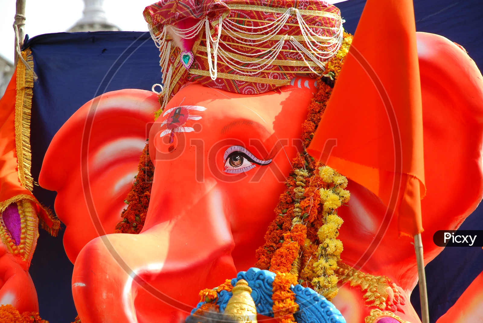 Lord Ganesh Idol Wih Saffron Colour Theme