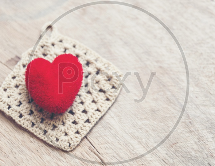 Love Heart On a Wooden Table Background With Vintage Filter For Valentines Day  Love Concept