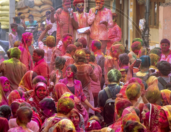 Crowd Dancing In Holi Festival Filled In colours