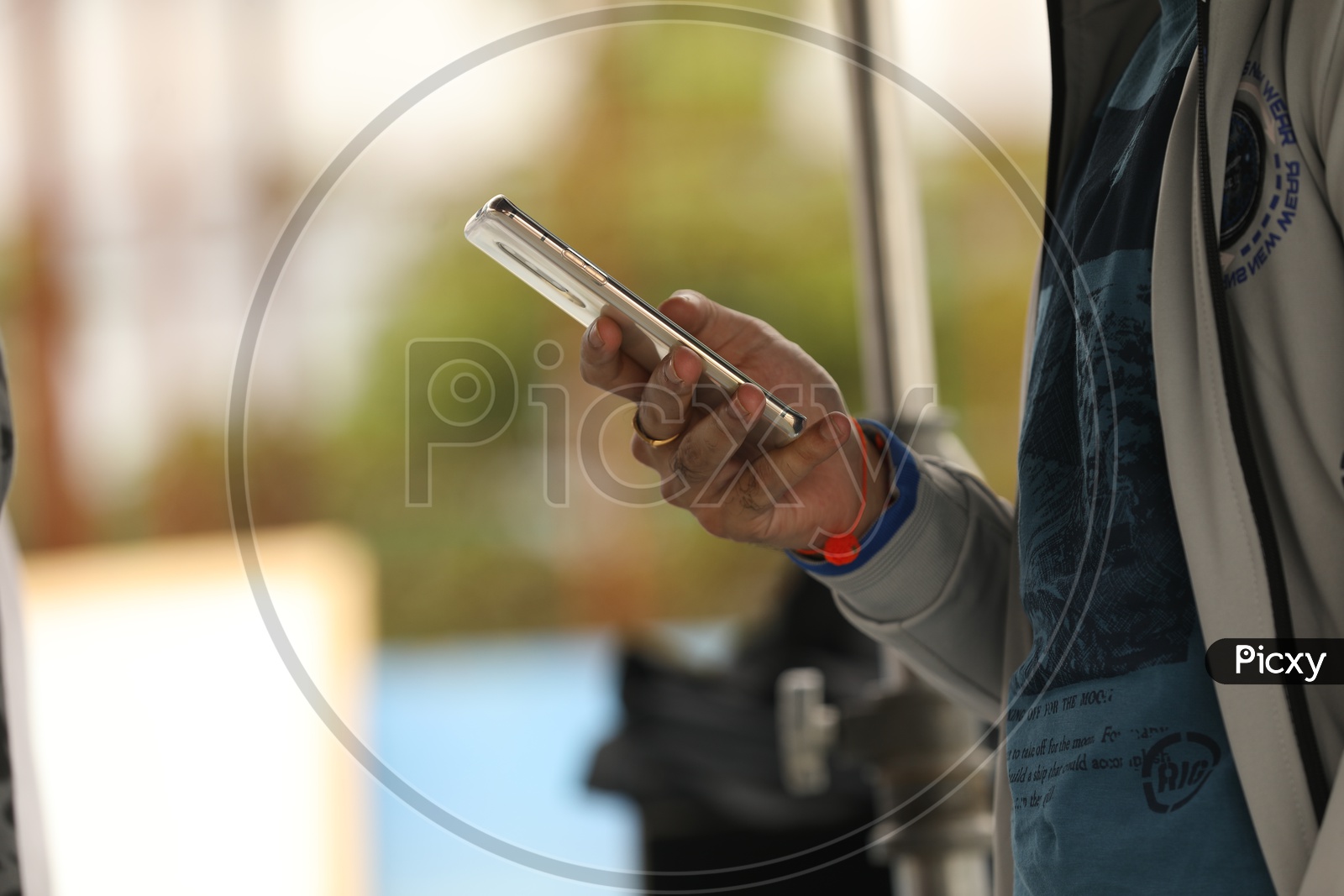 A Mobile Phone in the hands of a man