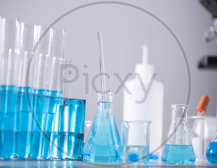 Conical flask and tubes containing blue solution