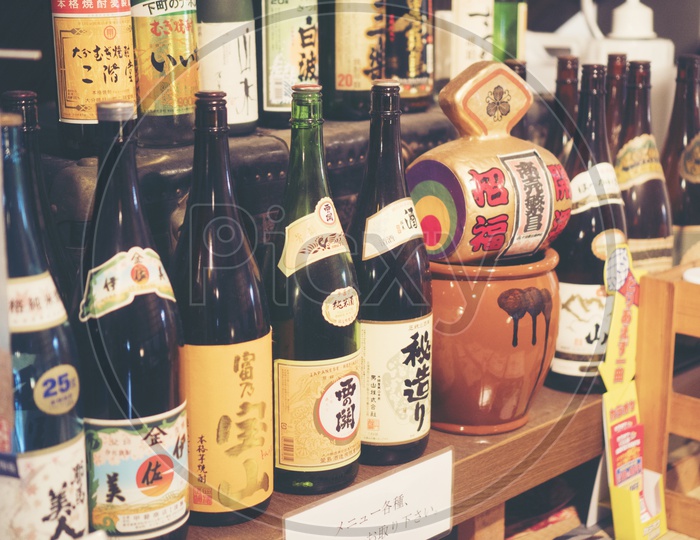 Sake Bottles on display in a Japanese restaurant, Tokyo
