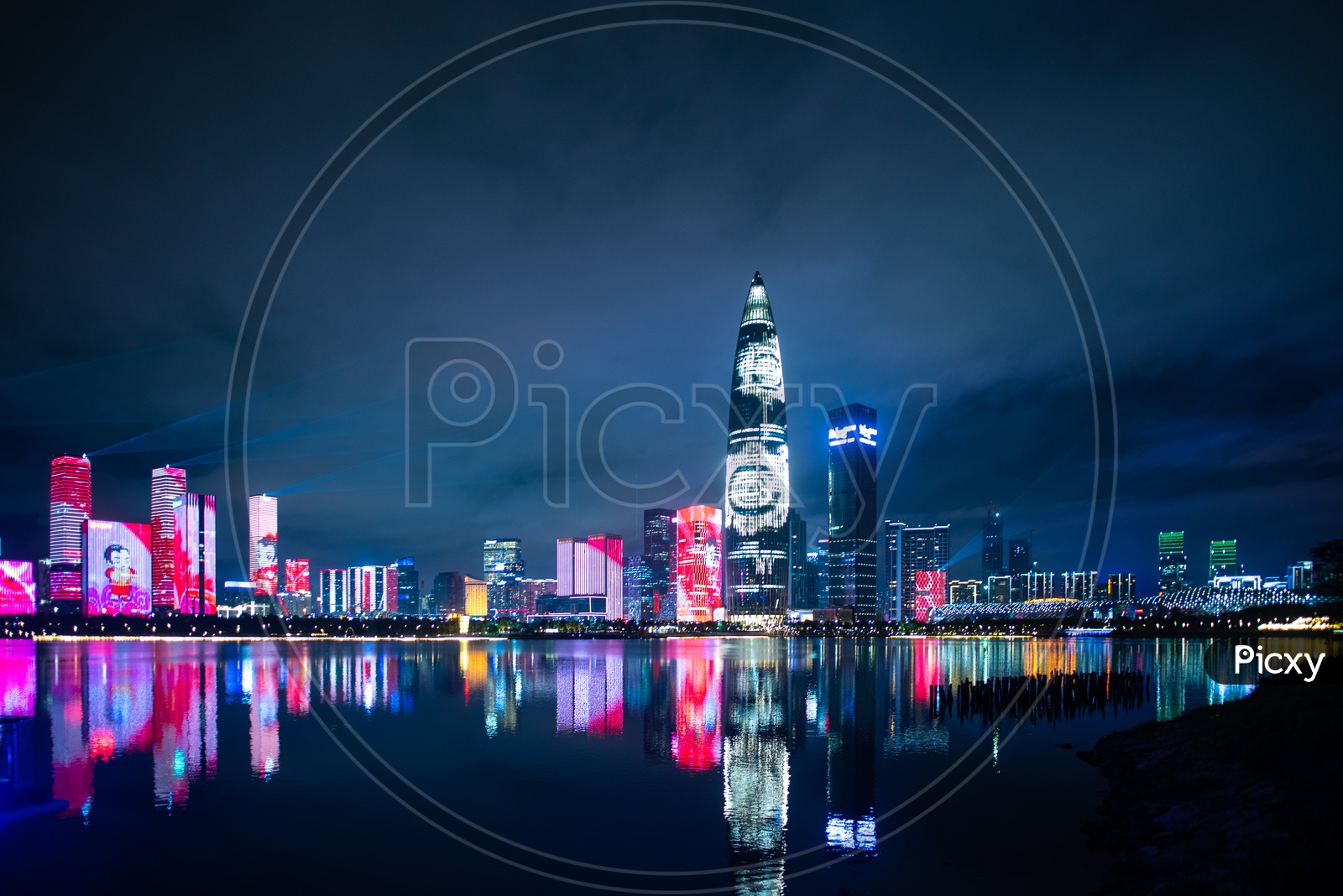 Reflection of Shenzhen cityscape during night in China