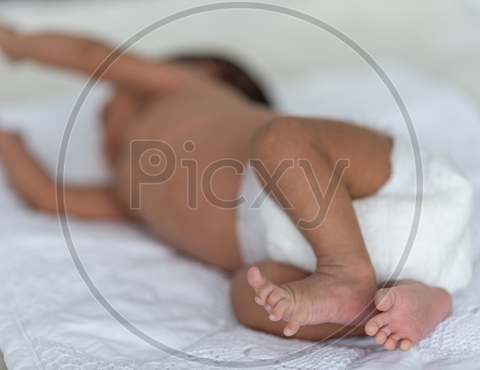 Newborn baby with diapers