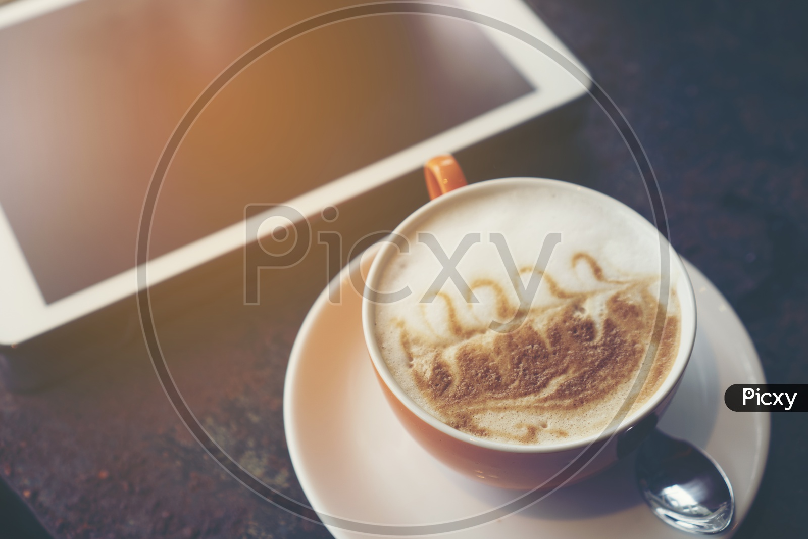 Coffee Latte Art in Coffee Shop Cafe and Tablet