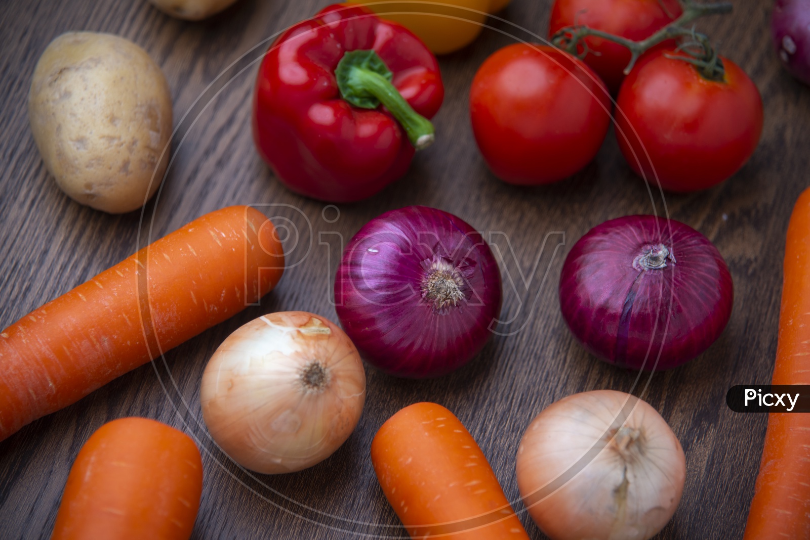 Organic Vegetables on Wooden Background